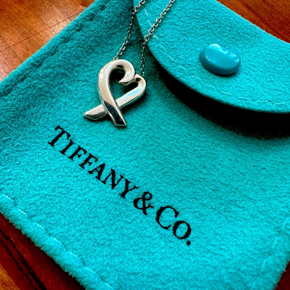 Tiffany & Co., Paloma Picasso Loving Heart Pendant.  Sterling Silver, 16” chain